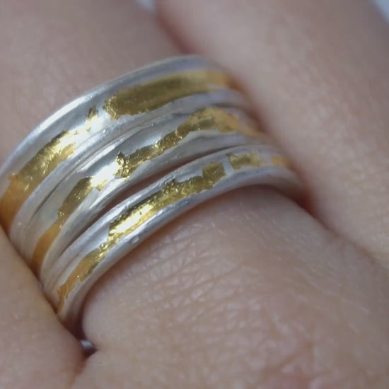 Two-tone gold and silver Keum-Boo ring worn on hand, minimalist and organic, ideal for stacking or as a wedding band.